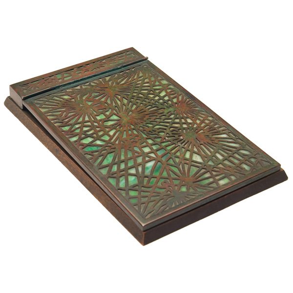 Tiffany Studios memo pad holder: Tiffany Studios memo pad holder, bronze in the pine needle pattern, over green glass, original patina, wooden mount, signed Tiffany Studios, New York, #1022, 5"w x 8"l