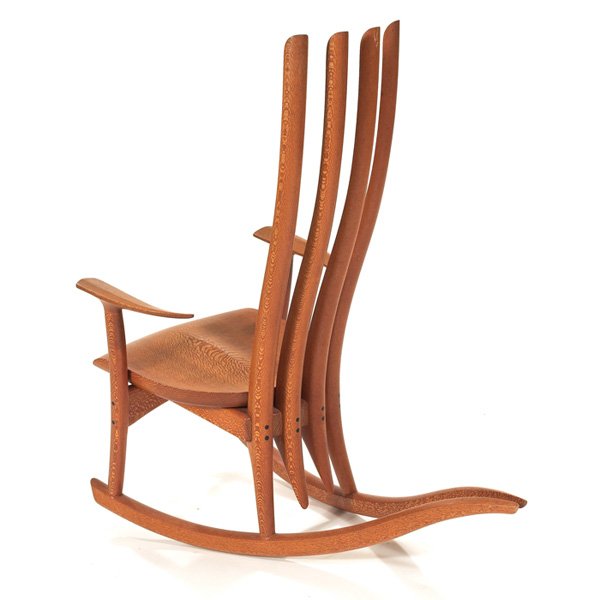 Warren Fenzi Exeter III lacewood rocking chair: Warren Fenzi "Exeter III" lacewood rocking chair, USA, 1997, custom made, four tall spindles to back, elongated rockers extend at back, signed with branded artist's signature, 25"w x 43.5"d x 45.25"h,
