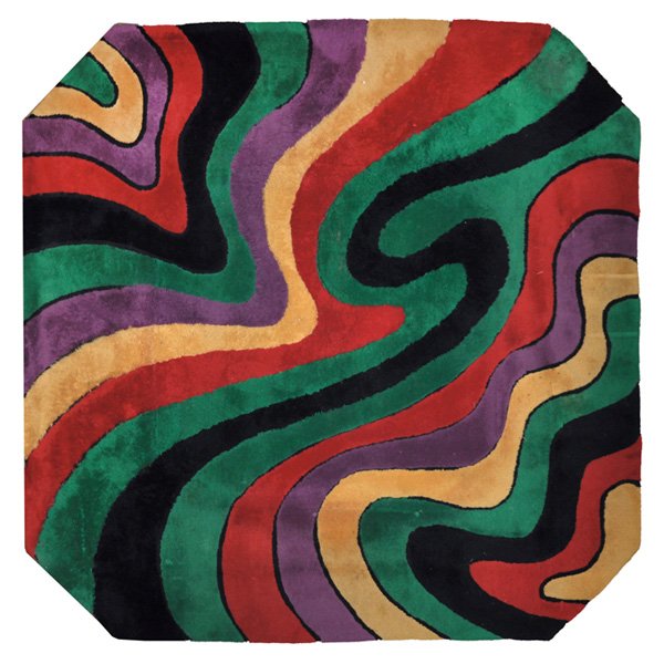 Edward Fields rug: Edward Fields rug, by Edward Fields, Inc., 100 percent virgin wool, square form with cut corners, swirling pattern in red, green, black, yellow and purple, signed "Edward Fields" along edge, 98" x 98"
