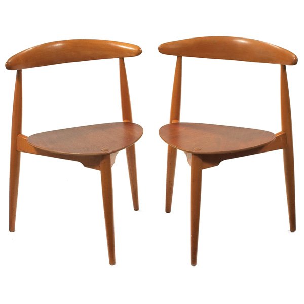 Hans Wegner stacking chairs: Hans Wegner stacking chairs, pair, by Fritz Hansen, beech and teak, triangular seats, curved backrest, original finish, signed with Fritz Hansen stamp and metal tag "Crafted in Denmark for Raymor", 17