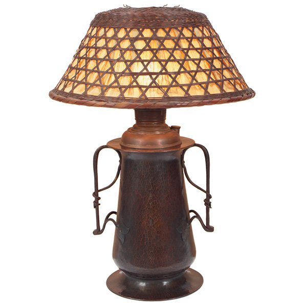 Gustav Stickley lamp hammered copper #294: Gustav Stickley lamp, #294, bold form with two twisted iron handles riveted to a hammered copper base supporting a Japanese basket shade with a replaced silk liner, impressed mark, re-patinated, origi
