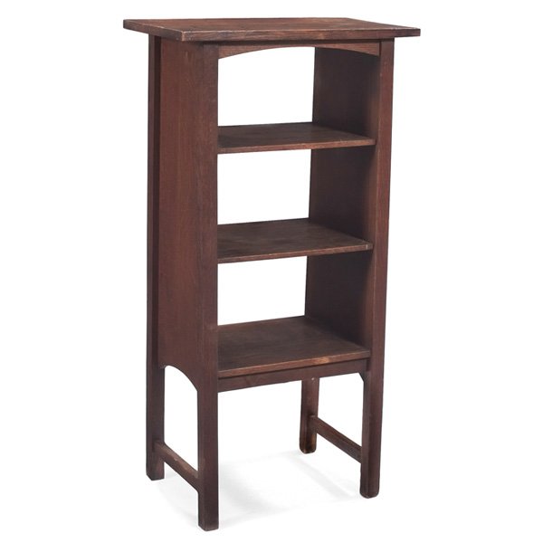 Gustav Stickley magazine stand #72: Gustav Stickley magazine stand, #72, Harvey Ellis influenced form with arched rail above three shelves, original finish, retailer's paper label, signature enhanced, brackets added for stability, some 