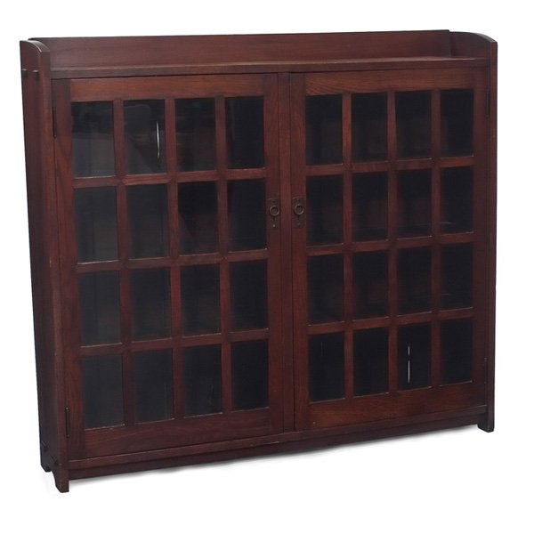 Gustav Stickley bookcase #544: Early Gustav Stickley bookcase, #544, two-door form with sixteen panes of glass per door and mitered mullions, original copper hardware, thru-tenon construction at sides, lightly recoated original fin