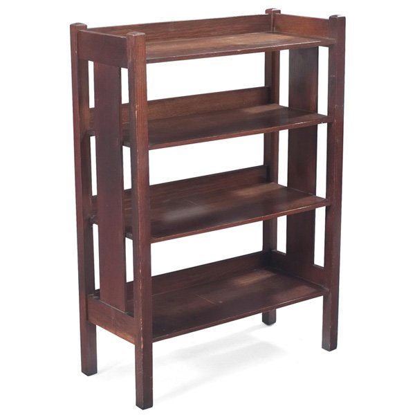 Gustav Stickley magazine stand: Gustav Stickley magazine stand, four shelves supported by a single wide vertical slat at each side, signed with paper label and branded signature, original finish, 27"w x 12"d x 38.5"h, very good cond