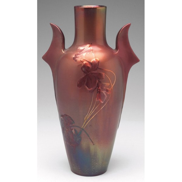 Delphin Massier vase: Delphin Massier vase, large tapered form with bat wing handles and cyclamen decoration, signed, 8"w x 13.5"h