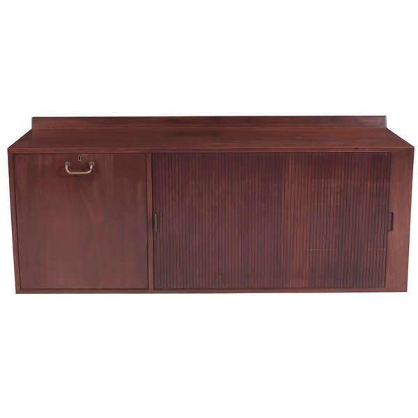 Finn Juhl wall cabinet: Finn Juhl wall cabinet, teak, one large tamboured door, one locking drop-front door conceals a bar, original brass handles, raised lip to back of cabinet, birch interior contains shelves and dividers,