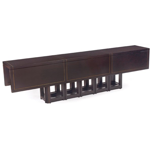 Large Edward Wormley drop-leaf dining console table Dun: Large Edward Wormley drop-leaf dining or console table, by Dunbar, large rectangular top over a geometric base with four fold-out legs to support top, grooved trim with gold leaf detail, unusual mecha