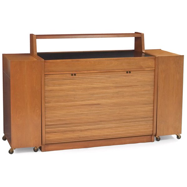 Edward Wormley buffet Dunbar model 4865: Edward Wormley buffet, by Dunbar, model 4865, three pieces, large central cabinet with black laminate top contains shelves and drawers behind a roll-down door, two separate but matching side cabinets 