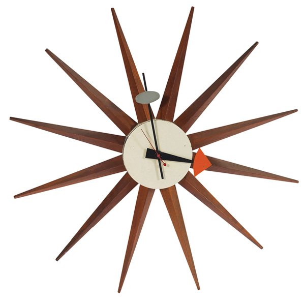 George Nelson Spike or Sunburst wall clock: George Nelson Spike or Sunburst wall clock, by Howard Miller, natural wood spikes around a white enameled metal dial, black and gray hour hands, red second hand, with cord, label to back, 18.5"dia, ex
