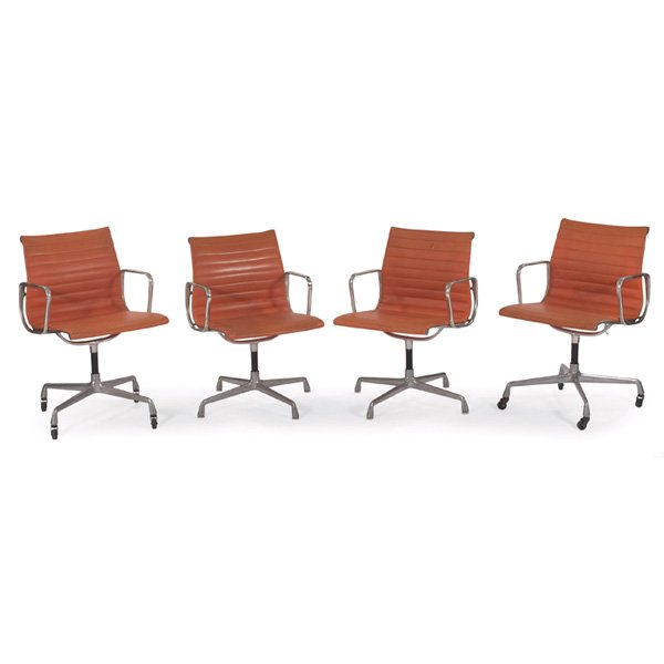 Charles and Ray Eames Aluminum Group chairs: Charles and Ray Eames Aluminum Group chairs, four, by Herman Miller, two with castors, original orange vinyl upholstery, 22.5"w x 20.5"d x 35.5"h, without castors: 33"h, flaking to armrests, wear to f
