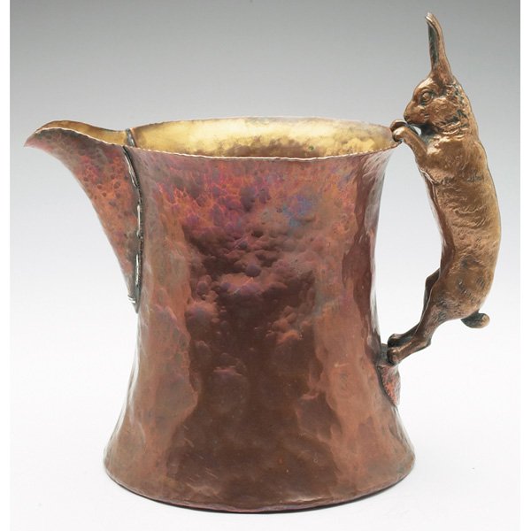 Joseph Heinrichs handled vessel copper "COPPER AND SILV: Joseph Heinrichs handled vessel, large hammered copper form, a finely detailed rabbit figure makes the handle, lightly cleaned original patina, marked "COPPER AND SILVER", 10"w x 10"h