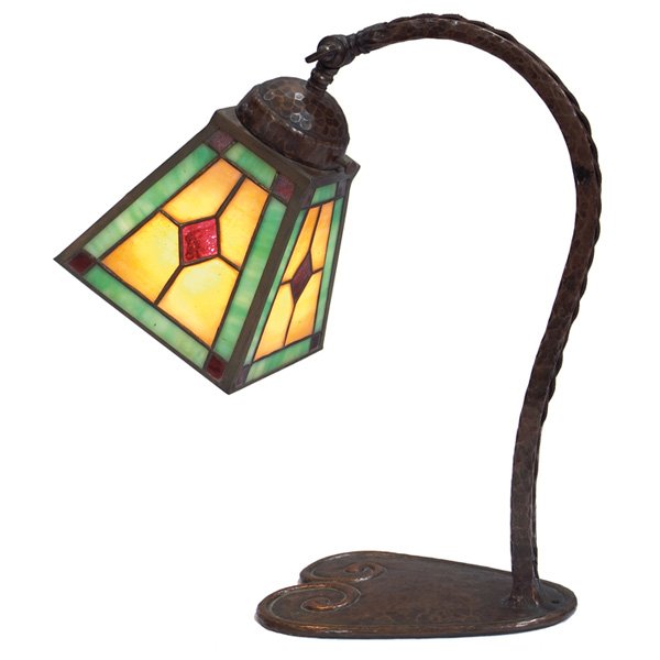 Arts & Crafts piano lamp hammered copper: Arts & Crafts piano lamp, hammered copper base with repousse design, leaded glass four panel shade with Prairie School design, unsigned, 12"w x 6"d x 14"h, very good condition