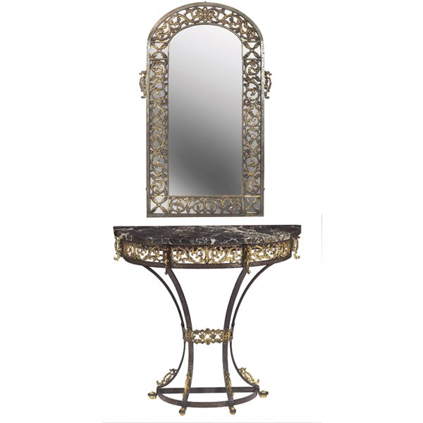Oscar Bach console table and mirror: Oscar Bach console table and mirror, arched mirror, demilune table with repaired marble top, each with pierced scrolling foliate decoration, signed, table: 30.5"w x 10.5"d x 30.5"h, mirror: 22"w x 36"