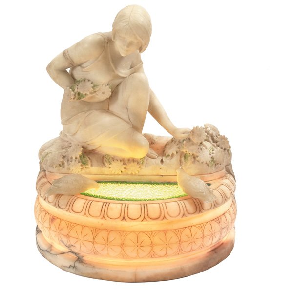 Italian Art Deco lamp: Italian Art Deco lamp, carved alabaster, depicting a young woman kneeling to pick flowers beside an illuminated pond with two birds along the edge, 14"w x 16.75"h