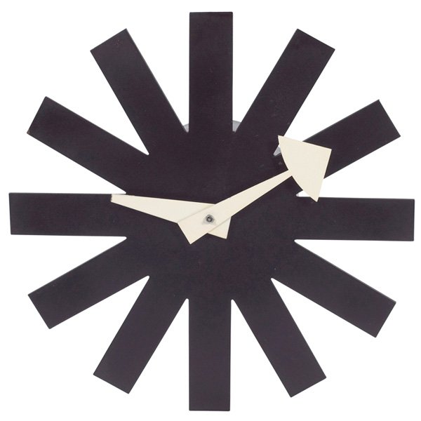 George Nelson Asterisk clock 2213: George Nelson Asterisk clock, by Howard Miller, model 2213, black enameled metal form with white enameled hands, original finish, signed with Howard Miller stamp to back, 10"dia, plugs in, second hand