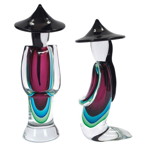 Luigi Onesto sommerso glass sculptures: Large Luigi Onesto sommerso glass sculptures, two, Murano, Italy, one standing figure and one kneeling figure in red, blue and green glass encased in clear glass, applied black hats and hair braids, s