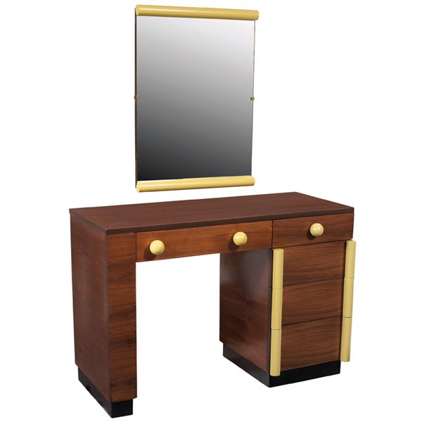 Gilbert Rohde vanity and mirror: Gilbert Rohde vanity and mirror, by Cavalier, walnut, black platform base with hidden castors, four drawers and a swing out shelf with the original exaggerated painted wood pulls, mirror with matching