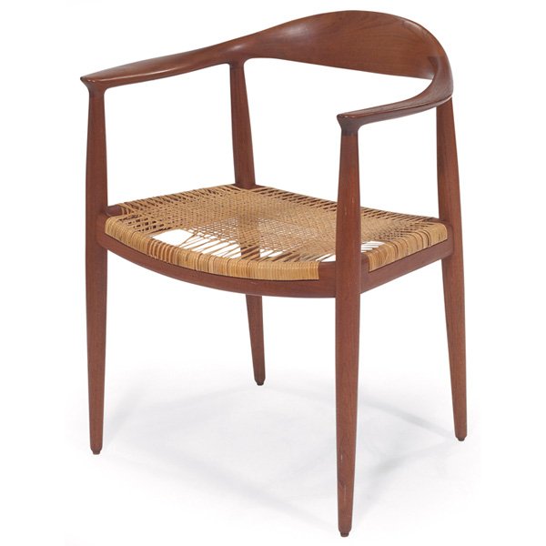 Hans Wegner chair: Hans Wegner chair, by Johannes Hansen, Denmark, teak frame, original caned seat, original finish, signed with branded Johannes Hansen marks and Knoll International label, 25"w x 20"d x 30"h, small bre