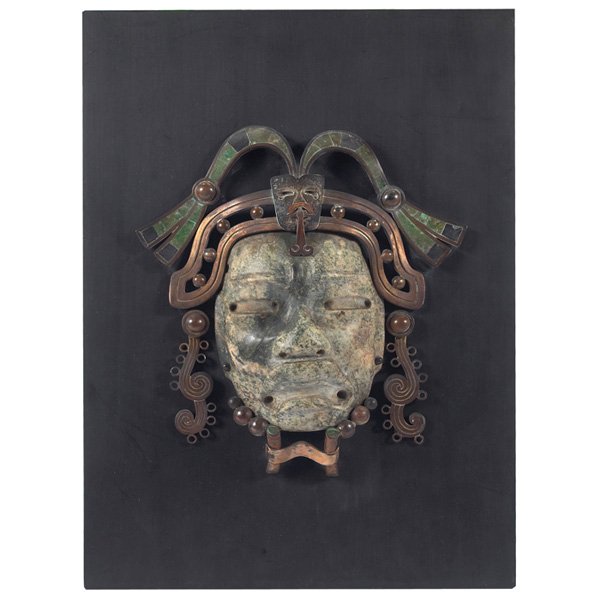 Los Castillo wall plaque: Los Castillo wall plaque, Taxco, Mexico, warrior's carved stone mask with a sterling and malachite headdress and movable copper earrings and trim, mounted on a black board, signed with silver hallmark