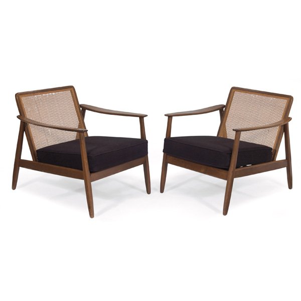 Mid-century lounge chairs: Mid-century lounge chairs, pair, angled beech wood frames, sloped armrests, caned backrests, black upholstered seat and back cushions, (back cushions not shown), original finish, 27"w x 30"d x 27.5"h,