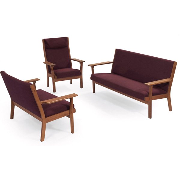 Hans Wegner set of lounge furniture Getama: Hans Wegner set of lounge furniture, by Getama, Denmark, oak, three-piece set including loveseat, chair and sofa, original dark purple wool cushions, original finish, chair signed with "Getama Gedsted