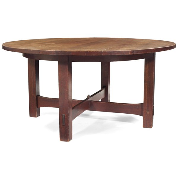 Gustav Stickley table: Good Gustav Stickley table, c. 1905, rare fixed-top form having a stacked trumpeted cross-stretcher base with central faceted peg and thru-tenon construction, original finish, unsigned, 60"dia x 29"h,