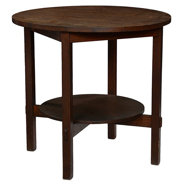 Stickley Brothers tea table, 2505: Stickley Brothers tea table, #2505, circular top over a lower shelf supported by through-tenon construction, signed with a Quaint metal tag, cleaned original finish, 28"dia x 26"h, very good condition