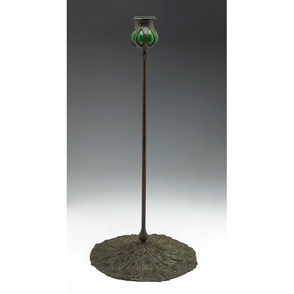Tiffany Studios candlestick, signed Tiffany Studios,: Tiffany Studios candlestick, bronze with a Queen Anne's lace design to foot and blown-out green glass at top, original patina, signed Tiffany Studios, New York, #3005, 8"w x 17.5"h