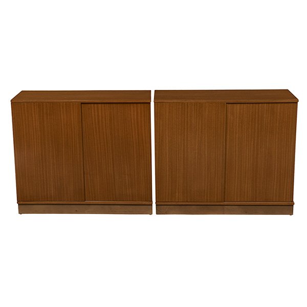 Edward Wormley cabinets, Dunbar: Edward Wormley cabinets, pair, by Dunbar, mahogany, clean-lined forms each with two sliding doors and two shelves, leather-wrapped platform bases, finished on all sides, original finish, 36"w x 18"d x
