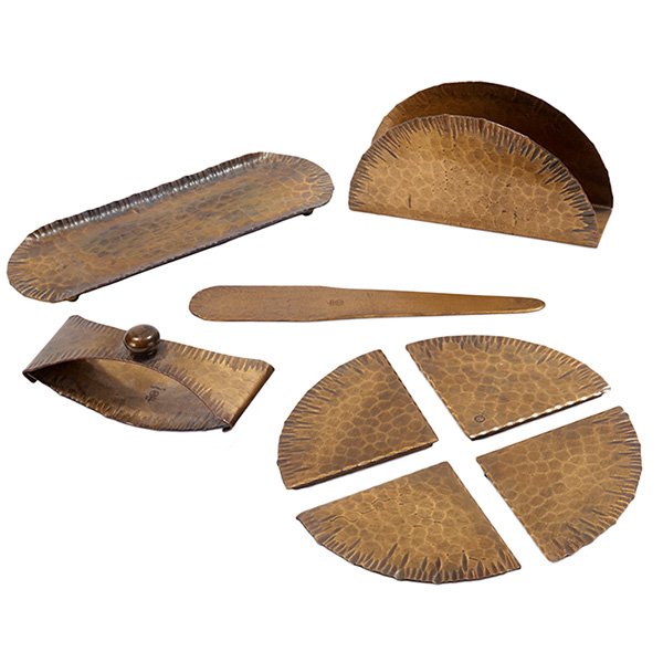 Roycroft desk set: Roycroft desk set, five pieces in hammered brass, consisting of blotter, blotter corners, letter opener, pen tray and letter rack, original patina, signed with orb, letter rack: 5.5"w x 1.5"d x 3"h