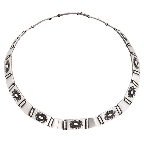 Henry Pilstrup for Georg Jensen sterling silver ‘Lotus': Henry Pilstrup for Georg Jensen sterling silver ‘Lotus' choker necklace, 1950s, alternating links with repeating stylized floral decoration, marked Georg Jensen / Sterling / Denmark / 60 B, interior