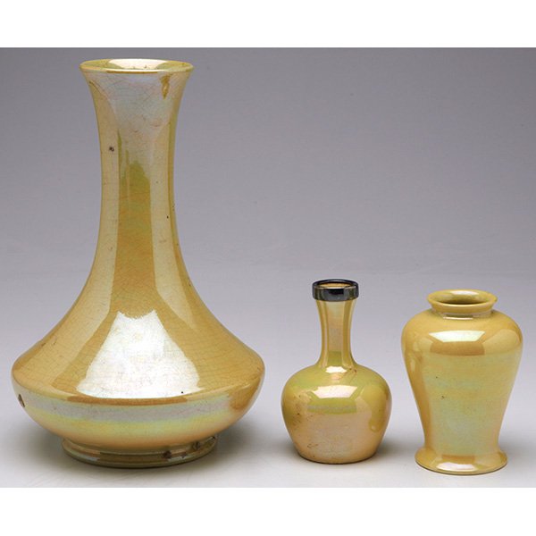 William Moorcroft vases: * William Moorcroft vase, c. 1920, flaring shape, 5.5"w x 8"h; with a William Moorcroft vase, c. 1920, bulbous shape, applied sterling silver rim with hallmarks, 2.5"w x 3.75"h; with a William Moorcro