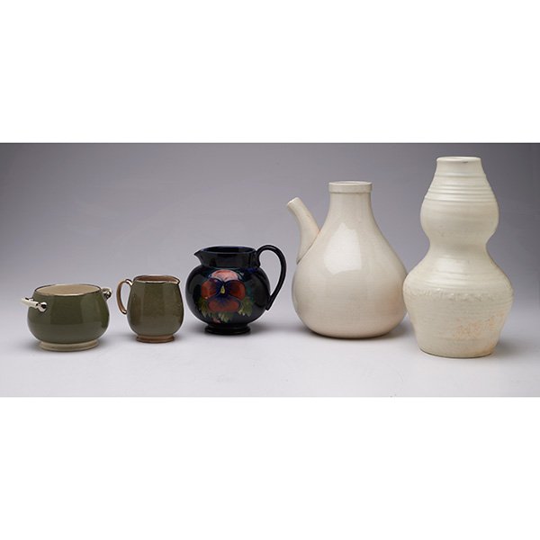 William Moorcroft sugar and creamer: * William Moorcroft sugar and creamer, c. 1915, covered with an olive green and ivory glaze, with silvering to rim and handles, largest: 5"w x 3"h; with a William Moorcroft handled vessel, c. 1950, de