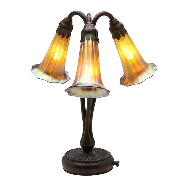 Tiffany Studios table lamp, three-light lily: Tiffany Studios table lamp, three-light lily, bronze base with a good original patina, holding gold glass shades, base signed Tiffany Studios, New York, #319, shades are unsigned, overall: 8"w x 13"h