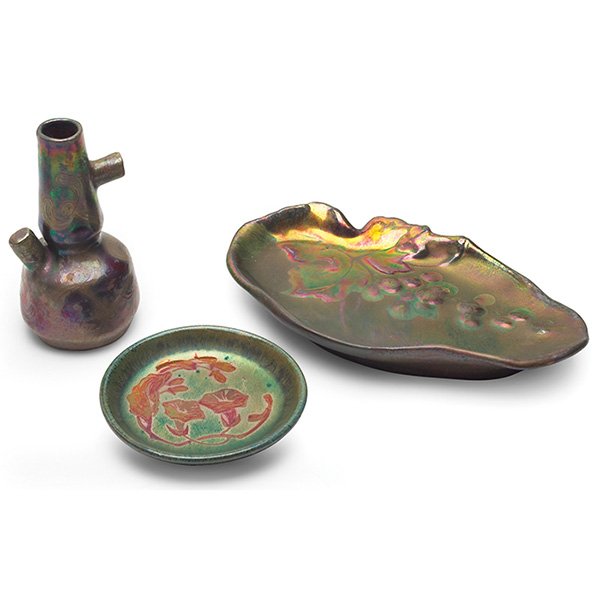 Delphin Massier vase, Montières tray: Delphin Massier vase, organic decoration, 2"w x 4"h; with an Art Nouveau plate, morning glory design, 3.5"dia; with a Montières tray, grape and leaf design, 4"w x 7"l, all under a colorful metallic g