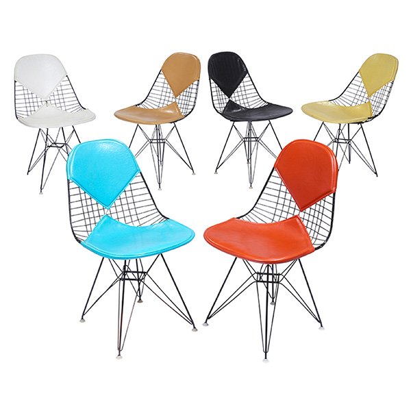 Charles & Ray Eames DKR-2 ("Eiffel Tower") dining: Charles & Ray Eames DKR-2 ("Eiffel Tower") dining chairs, six, by Herman Miller, c. 1960, black wire seats and bases with the original colorful vinyl Bikini pads, one white,one mustard, one black, one