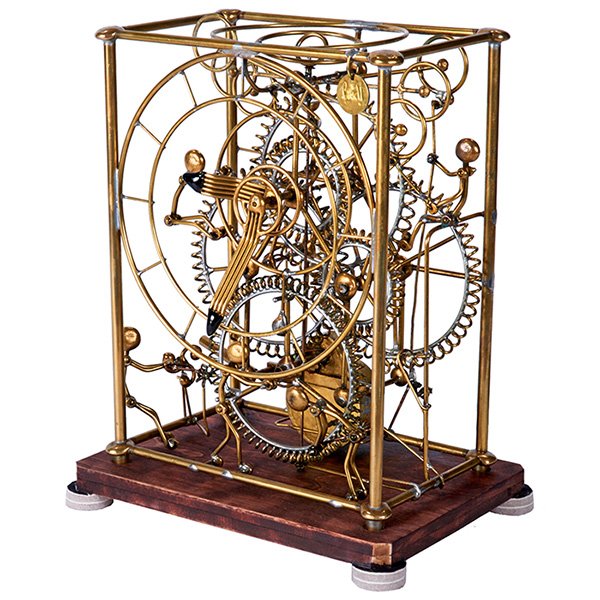 Gordon Bradt Six-Man kinetic clock, by Kinetico Studios: Gordon Bradt Six-Man kinetic clock, by Kinetico Studios, brazed and molten brass, motorized, six figures driving levers and cranks appear to operate the clock, wood base, signed with metal Bradt tag, 
