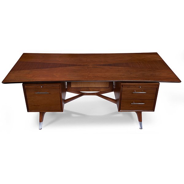 Italian desk, 1950s: Italian desk, 1950s, rectangular walnut top with slight bow-tie shape with inlaid pattern to surface, tapered legs with sculptural cross-stretcher, original caned privacy panel, three drawers and two