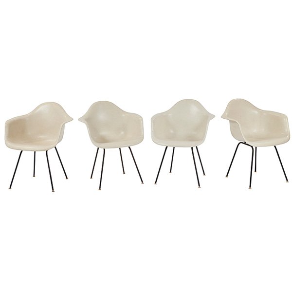 Charles & Ray Eames DAX shell chairs, set of four, by: Charles & Ray Eames DAX shell chairs, set of four, by Herman Miller, c.1958, parchment fiberglass shells over black steel H bases, original shock mounts intact, original finish, 24.75"w x 23"d x 31.5"