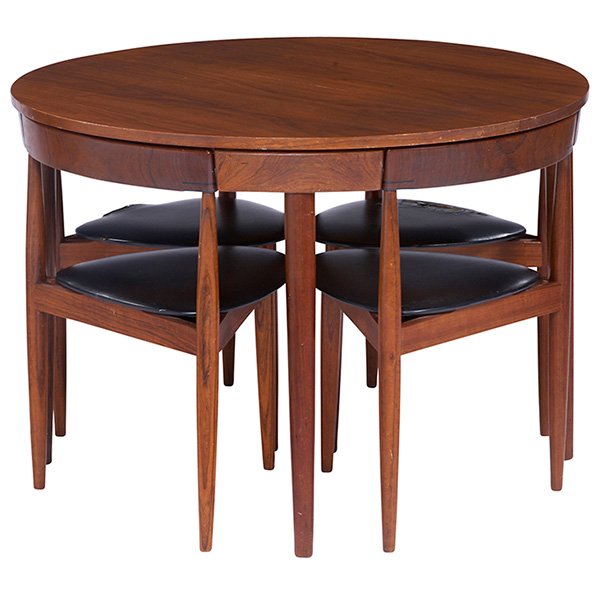 Hans Olsen dining set, by Frem Rojle, Denmark, 1960s: Hans Olsen dining set, by Frem Rojle, Denmark, 1960s, teak, round table and four chairs with original black vinyl upholstery, chair backs fit into the apron of the table, one 19.75" self-storing leaf,