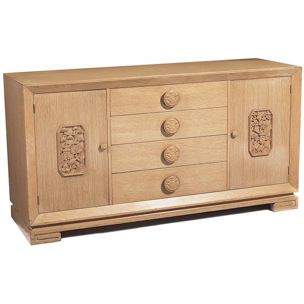 James Mont style sideboard: James Mont style sideboard, cerused oak with Chinoiserie details, four center drawers with large carved round pulls flanked by two drawers, doors conceal one small drawer and a shelf, original finish,