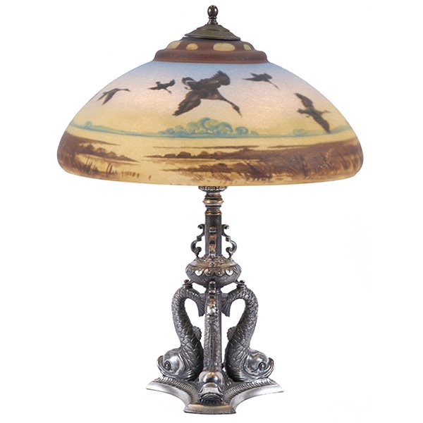 The Pairpoint Corporation, Canada Geese table lamp: The Pairpoint Corporation, Canada Geese table lamp, New Bedford, MA, glass, silvered metal, copper, unsigned, overall: 16"dia x 20"h, Provenance: Property from the Collection of Governor Jim Thompson,