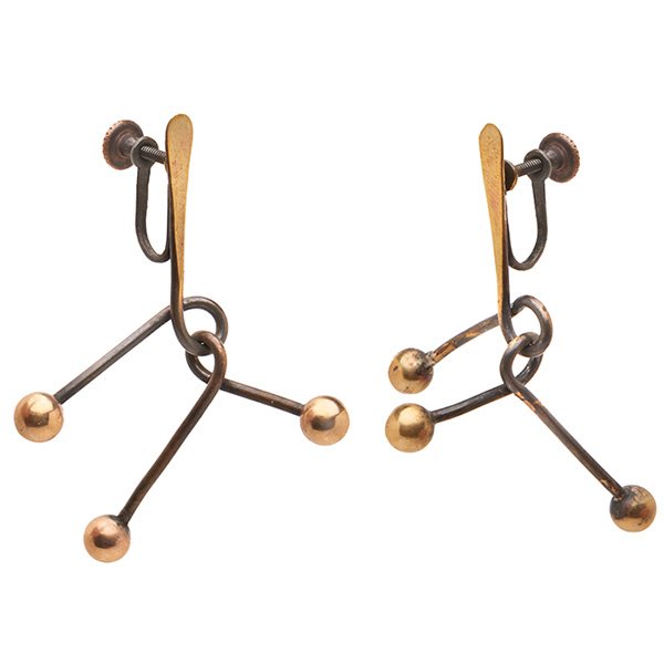 Art Smith, (1917-1982), earrings: Art Smith, (1917-1982), earrings, pair, Brooklyn, NY, brass, unmarked 1.5"w x 2"l, Lot accompanied by one copy of the Brooklyn Museum catalog, From the Village to Vogue: the Modernist Jewelry of Art S