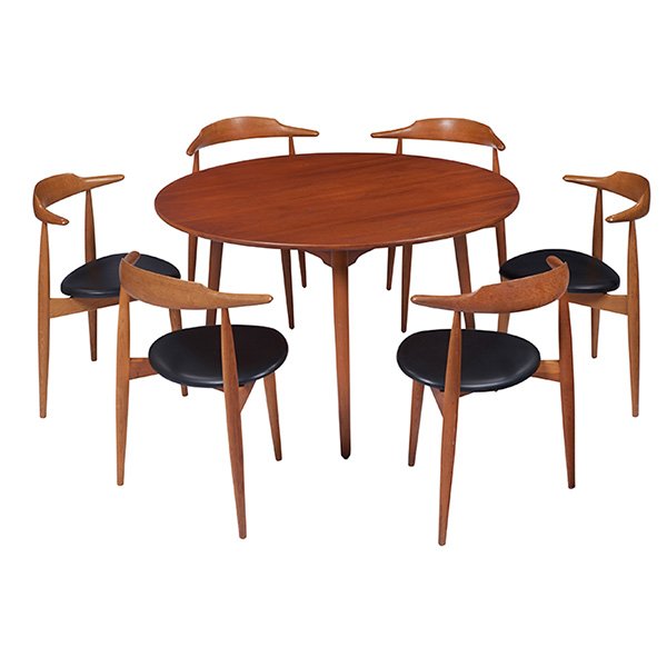 Hans Wegner, dining table and six chairs: Hans Wegner, dining table and six chairs, Fritz Hansen, Denmark, 1960s, oak, teak, vinyl upholstery, signed with Fritz Hansen and Danish Control labels, table: 47.25"dia. x 28"h, chairs: 23"w x 18.5"d