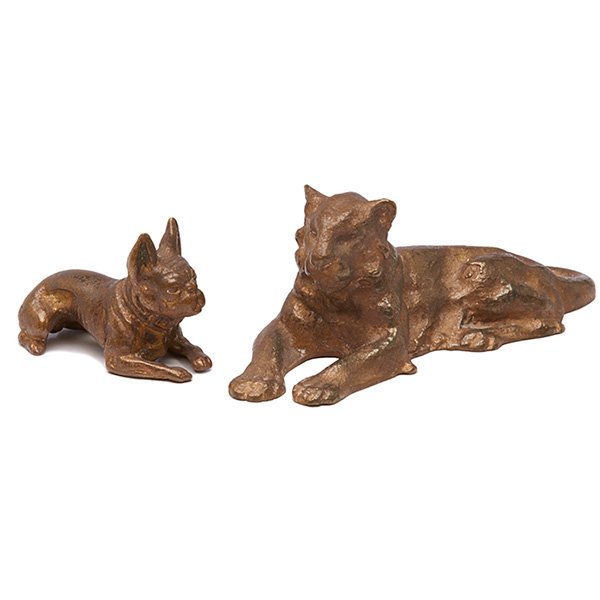 Tiffany Studios figural paperweights: French bulldog,: Tiffany Studios, figural paperweights: French bulldog, #933 and lioness, #932, New York, NY, patinated bronze, stamped signatures, numbered, larger: 5"l x 1.75"h, Property from: The Warshawsky Collect