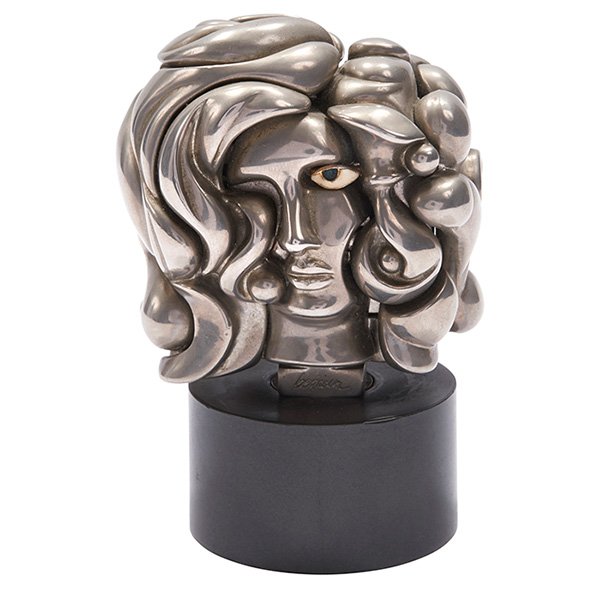 Miguel Berrocal Portrait de Michele puzzle sculpture: Miguel Berrocal, Portrait de Michele puzzle sculpture, Spain, 1969, nickel-plated Zamak, acrylic, cubic zirconia, stamped Berrocal signature and 6830, number 6830 from the edition of 9500, 3"w x 2.25"