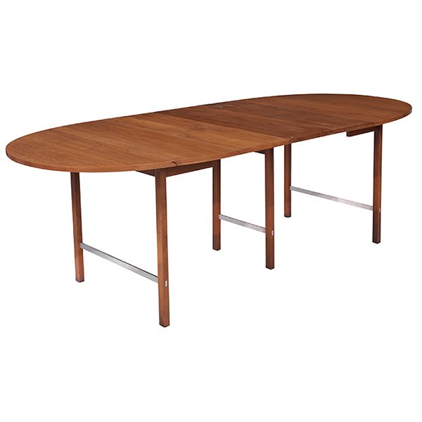 Paul McCobb drop-leaf dining table 40"w x 25.5"d x 29"h;: Paul McCobb, drop-leaf dining table, Calvin, walnut, aluminum, Calvin tag, three 12" leaves, 40"w x 25.5"d x 29"h; with leaves: 90". Provenance: Property from the Estate of Jeannette Fields, Oak Park,