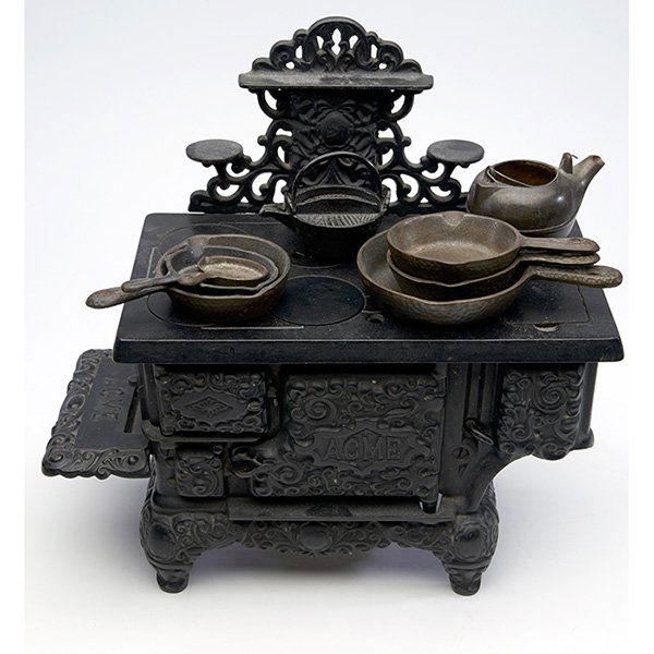 Acme child's stove with implements 13.5”w x 7.5”d x (1 of 2)