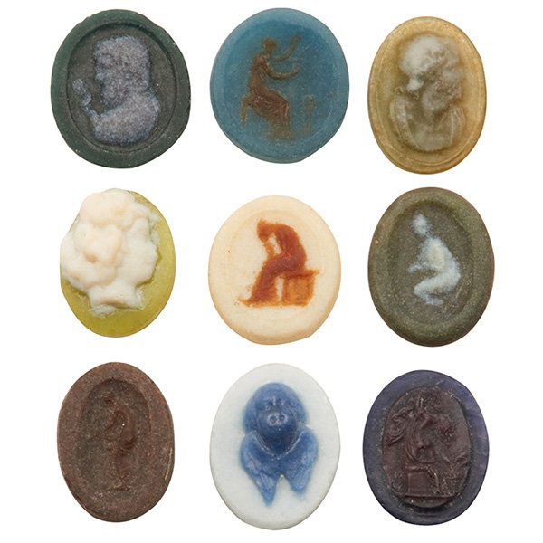 Henri Cros (1840-1907), attribution, medallions, group: Henri Cros (1840-1907), attribution, medallions, group of nine, France, pate-de-verre glass, all unsigned, Greek and Roman influences, largest: 1"l Literature: Victor Arwas, Glass, Art Nouveau to Art