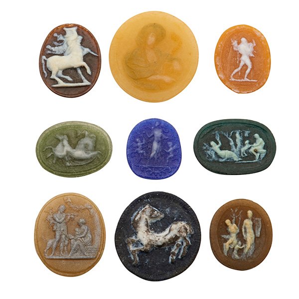 Henri Cros (1840-1907), attribution, medallions, group: Henri Cros (1840-1907), attribution, medallions, group of nine, France, pate-de-verre glass, all unsigned, Greek and Roman influences, largest: 2.5"dia Literature: Victor Arwas, Glass, Art Nouveau to